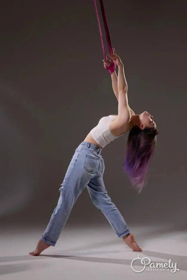 Pamely in a backbend from aerial straps
