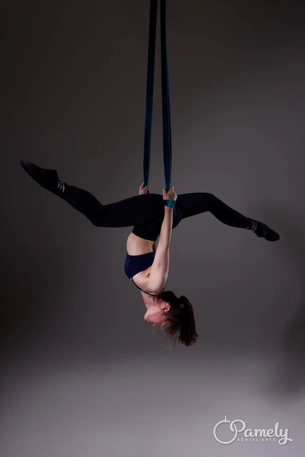 Pamely in a split in the aerial hammock