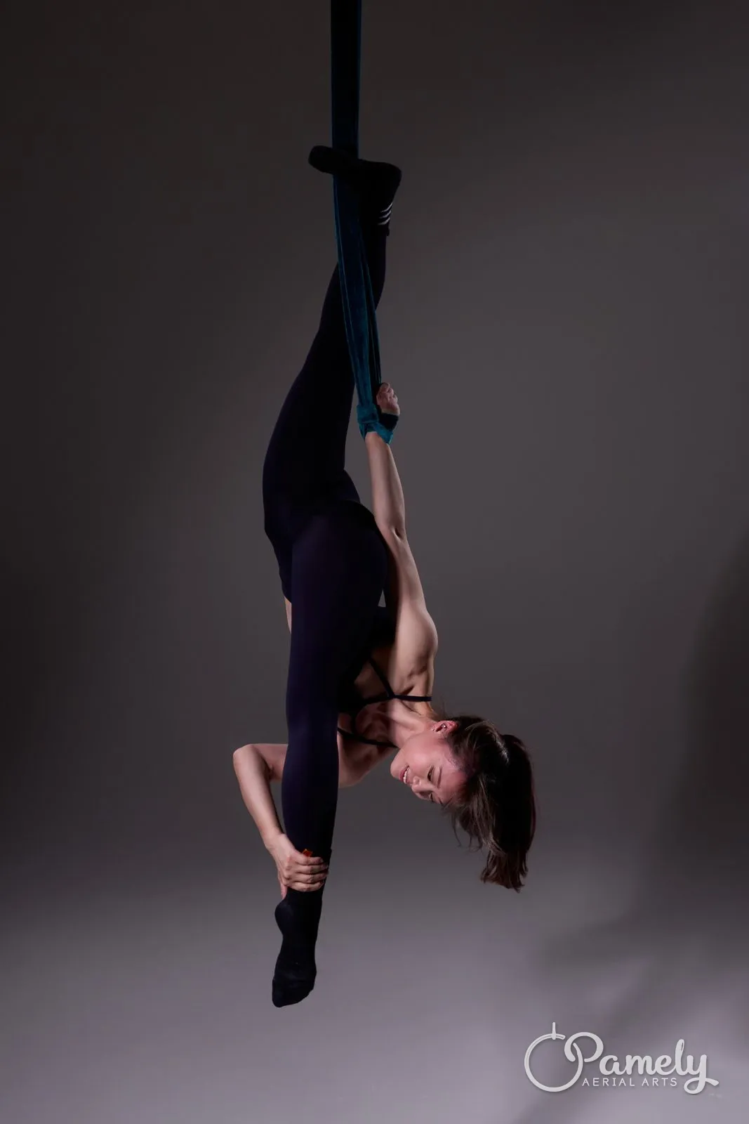 Pamely inverted in the aerial hammock