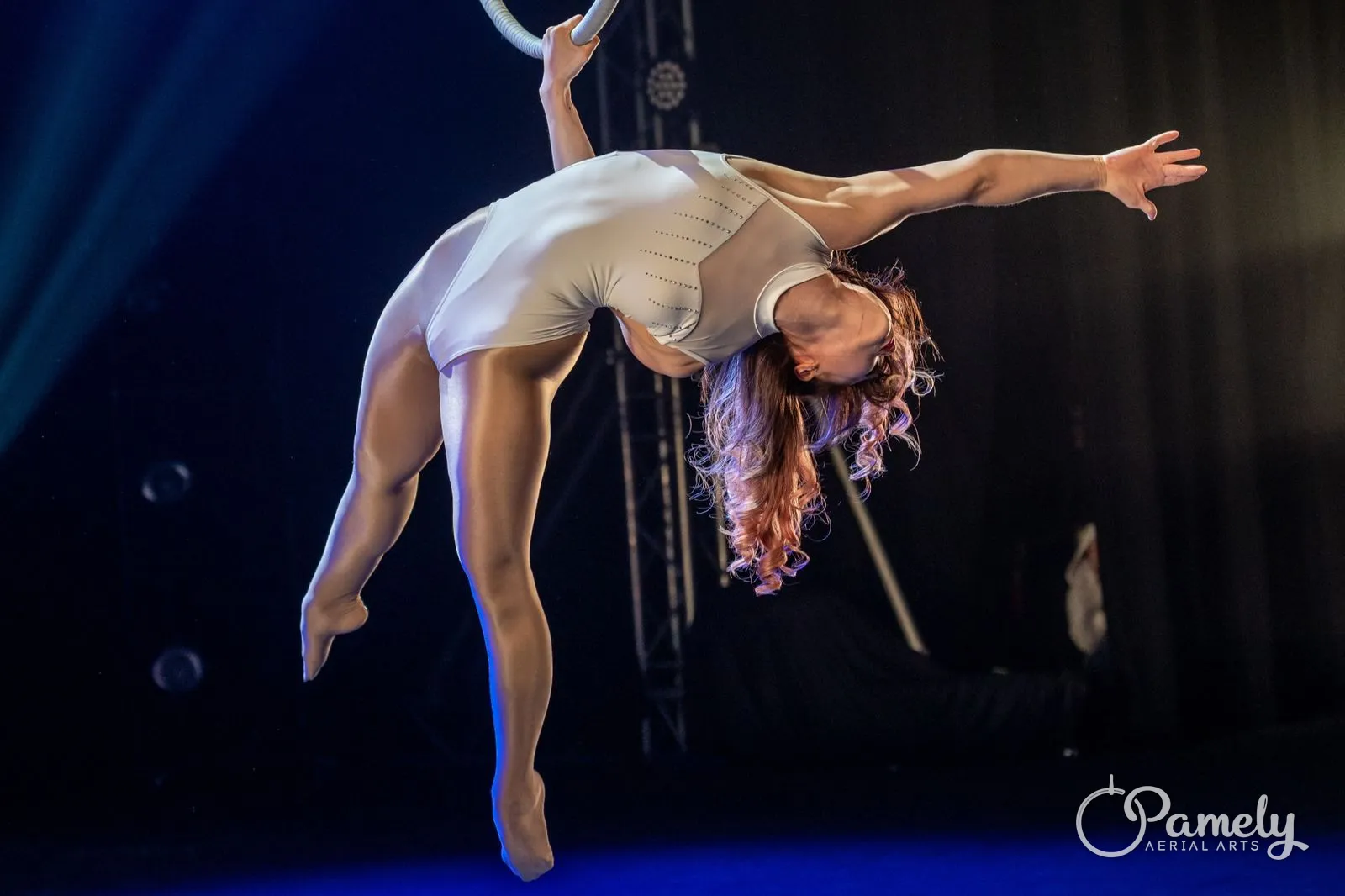 Pamely in a backbend on the hoop on stage